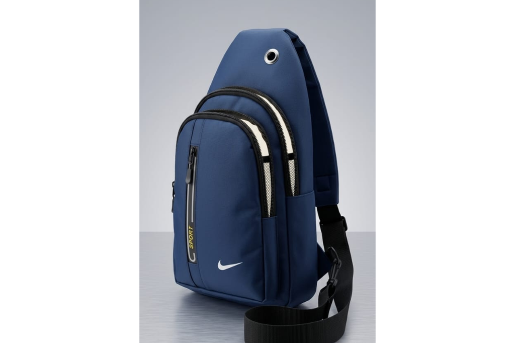 Blue sling bag with a Nike logo on a gray background