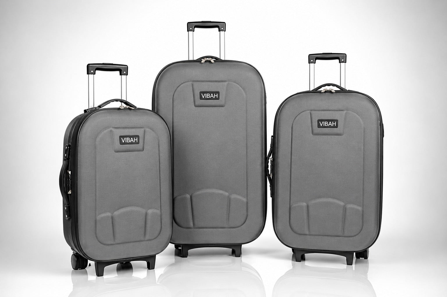 Three gray suitcases with 'Vibah' branding on a white background