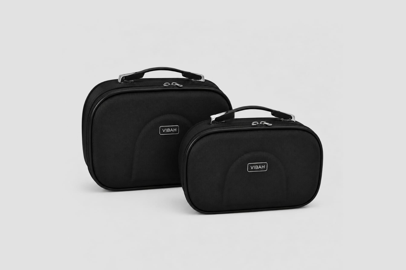 Two black carrying cases with 'Vibah' branding on a light gray background
