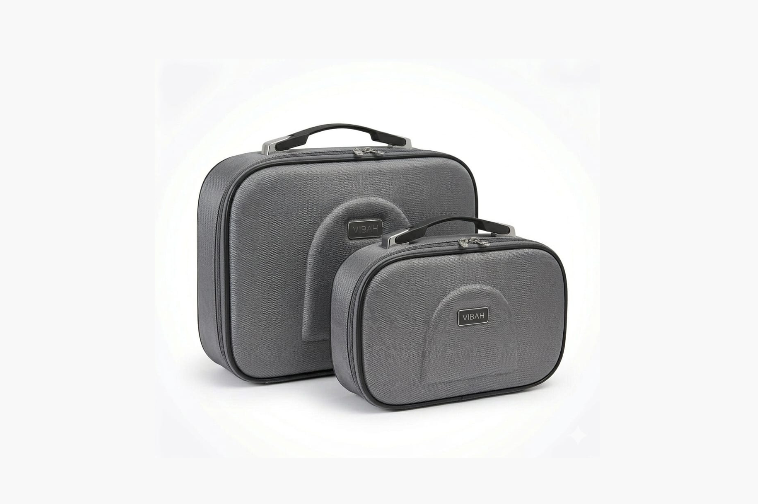 Two gray travel cases on a white background