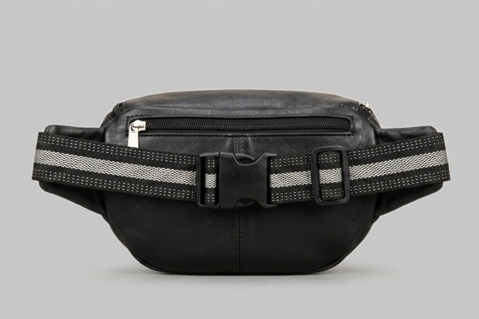 Black waist bag with reflective strap on a gray background